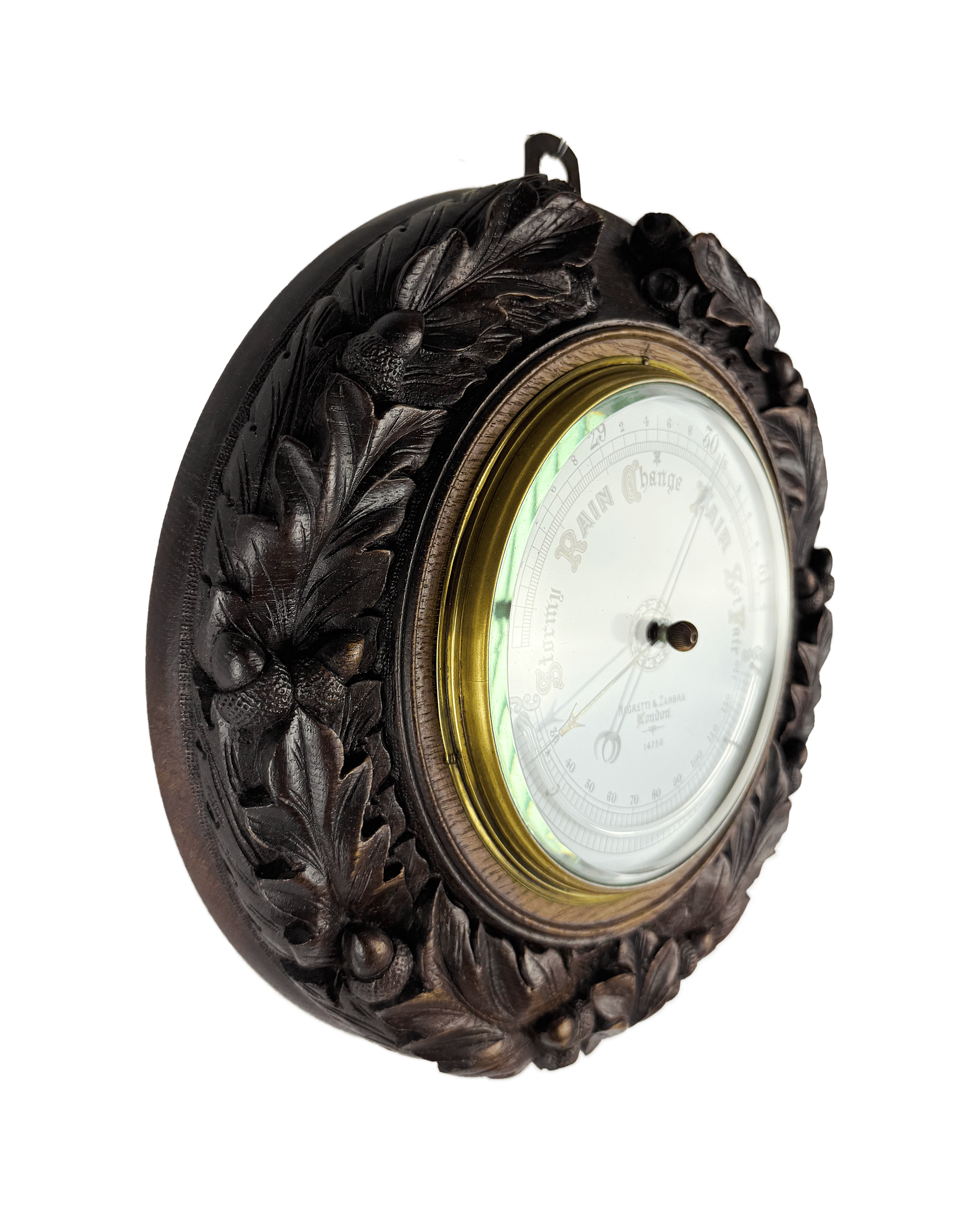 Carved oak round aneroid barometer