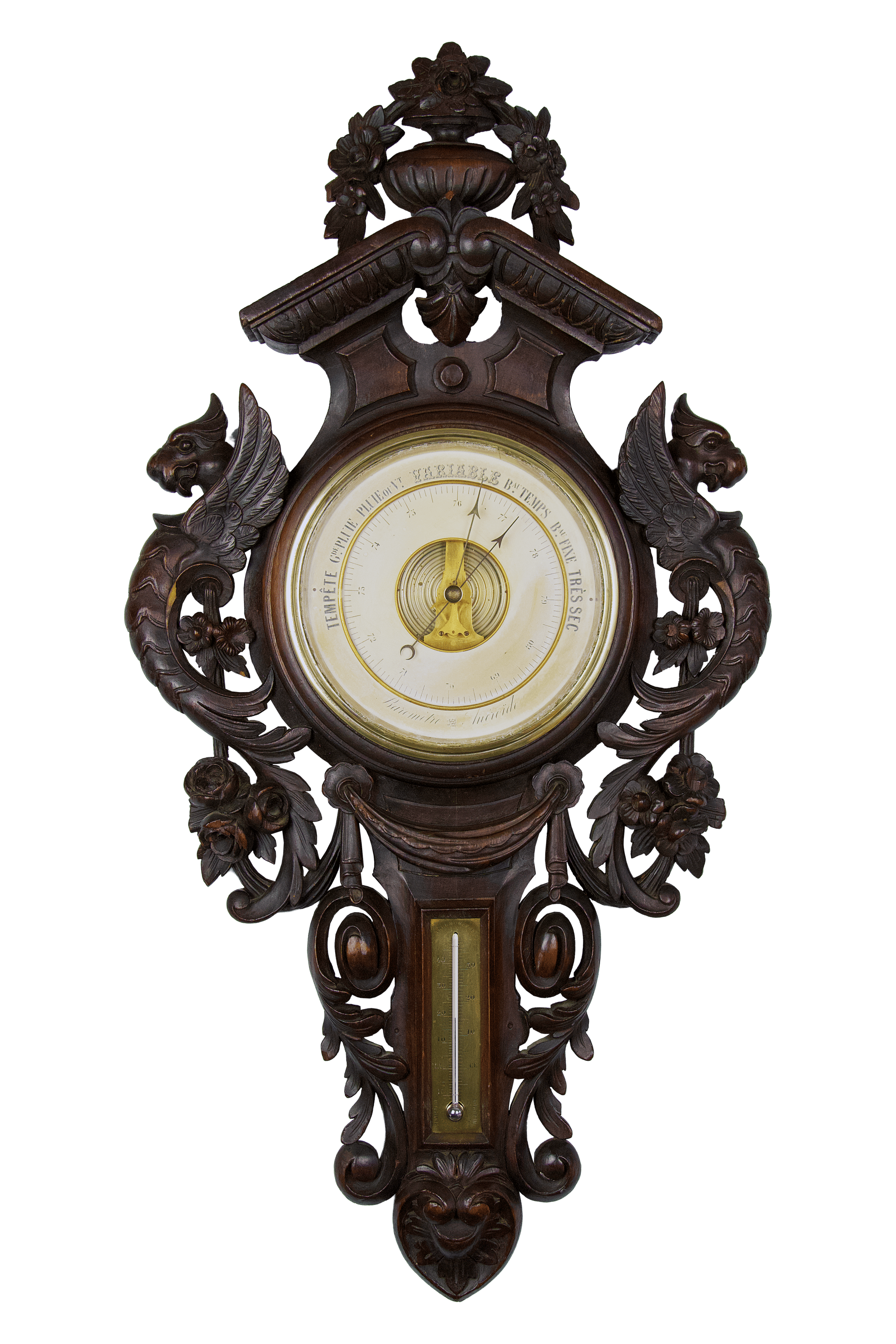 Carved oak case with griffins barometer