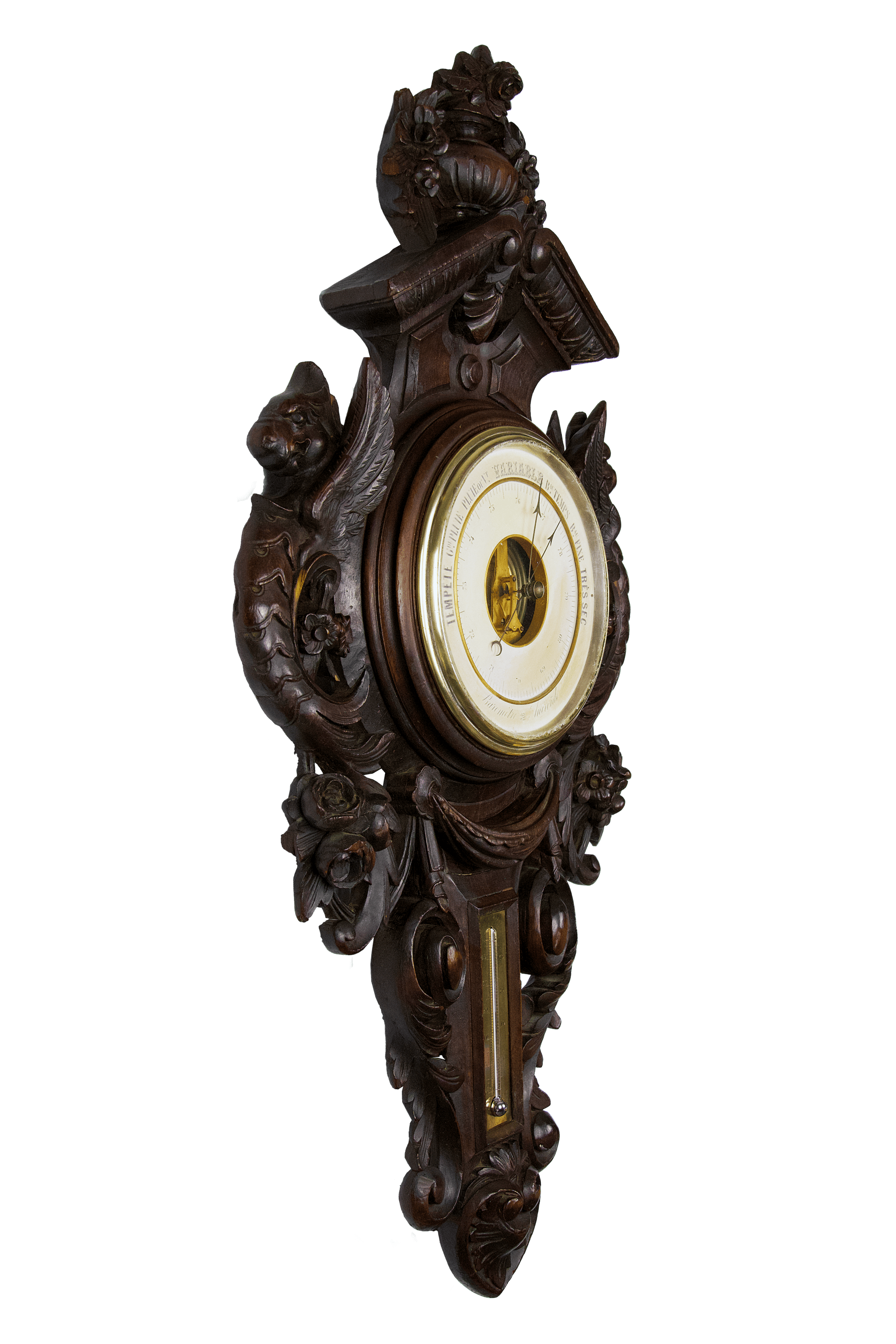 Carved oak case with griffins barometer
