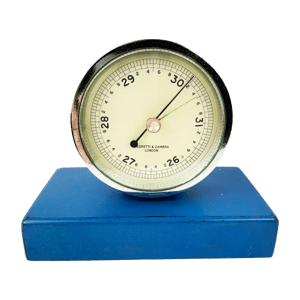 Chrome desk barometer on a stand