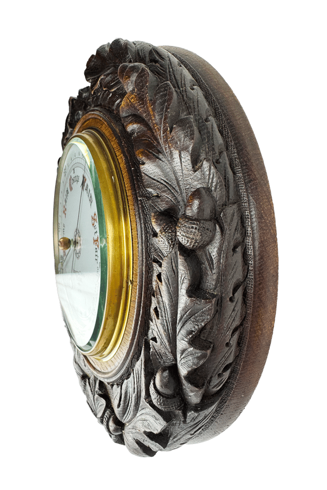 Carved oak round aneroid barometer thumbnail 2