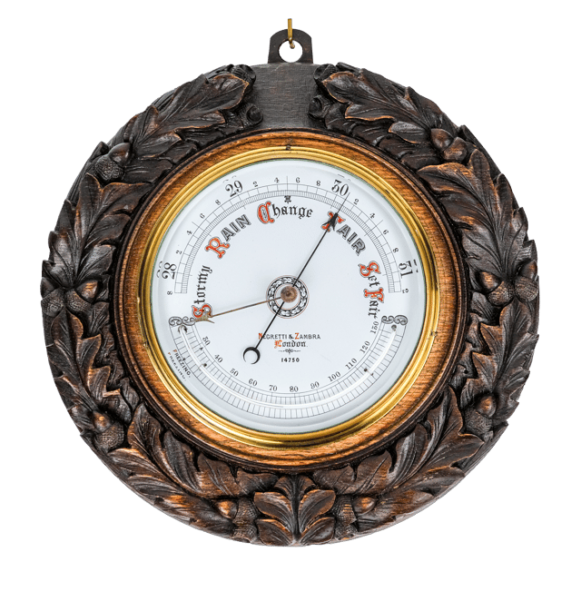 Carved oak round aneroid barometer