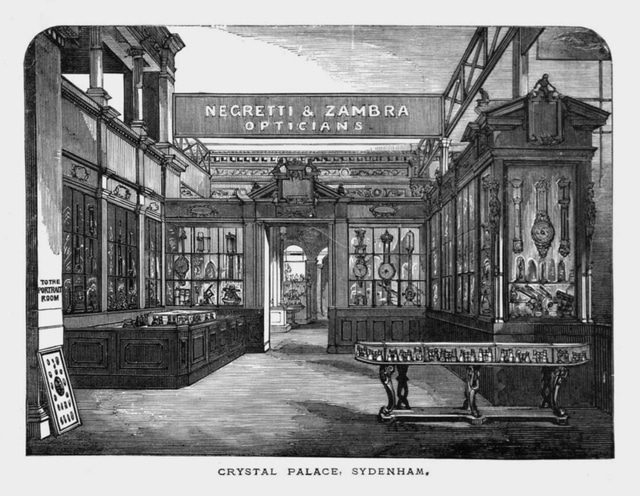 Carved oak English wall-mounted barometer