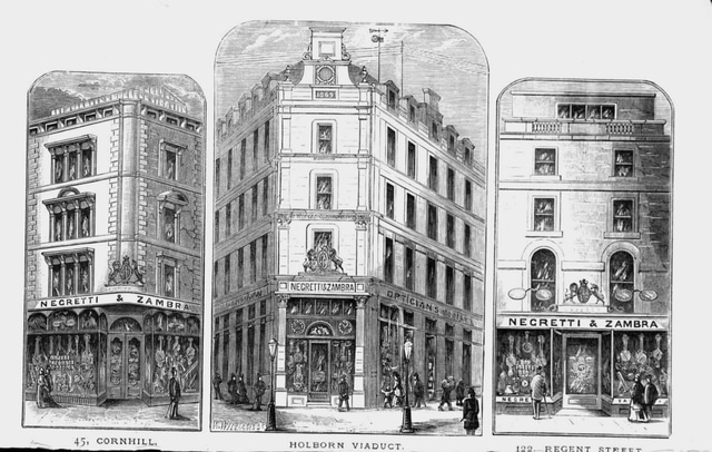 Carved oak English wall-mounted barometer