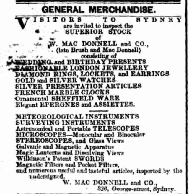 Brass-cased barometer in a mahogany casket with a strap